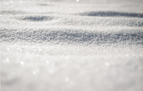 A Close Up Of Snow Showing Texture
