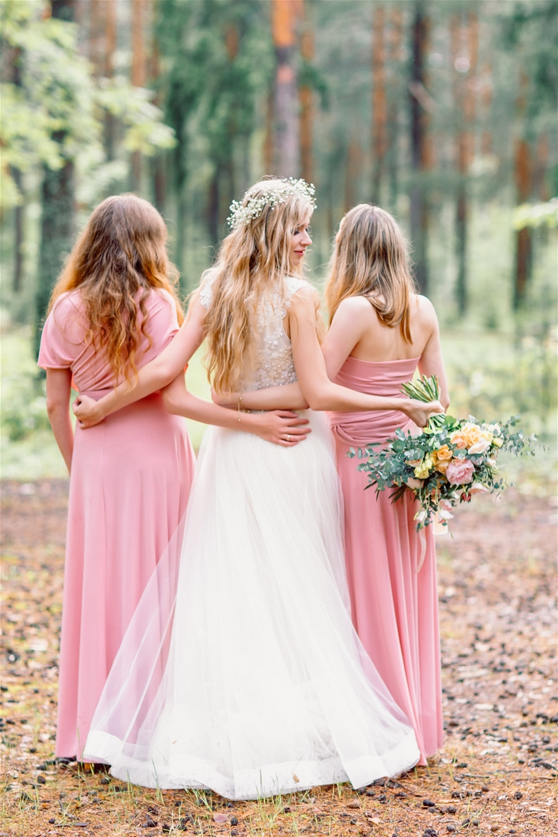 Bride and Bridesmaids in Woods