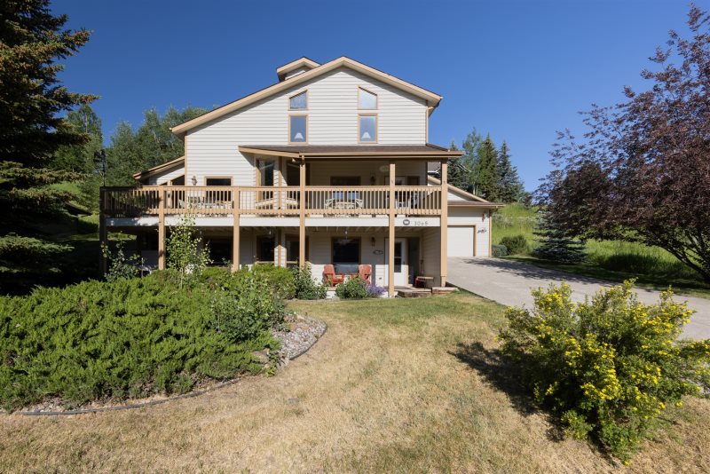 1 (3) Front of Alpenglow Retreat Vacation Rental during Summer in Big Sky Montana