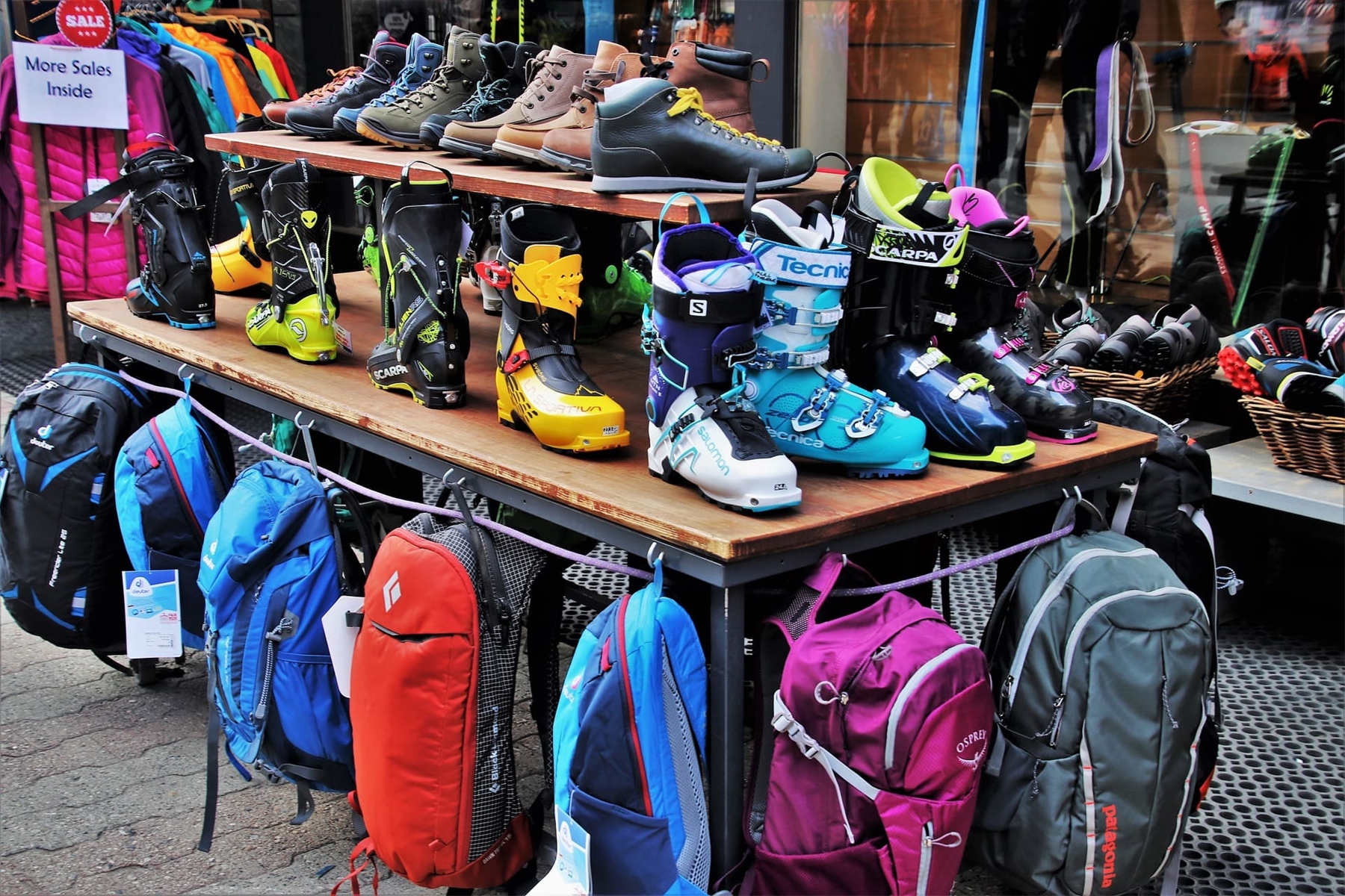 Ski Boots for Sale on Table in Shop
