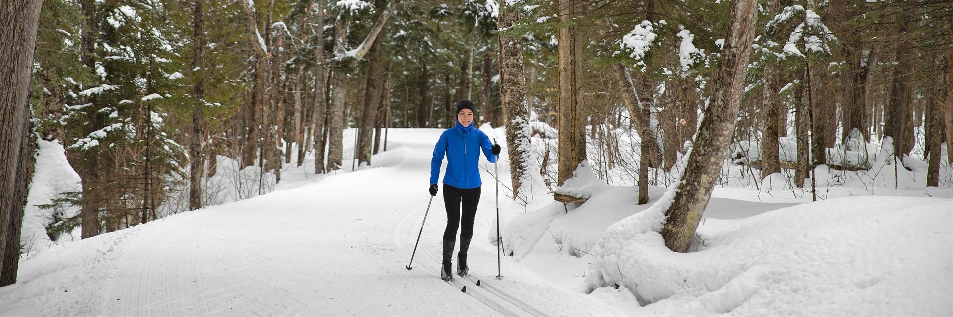 Woman Cross Country Skiing in Big Sky Montan