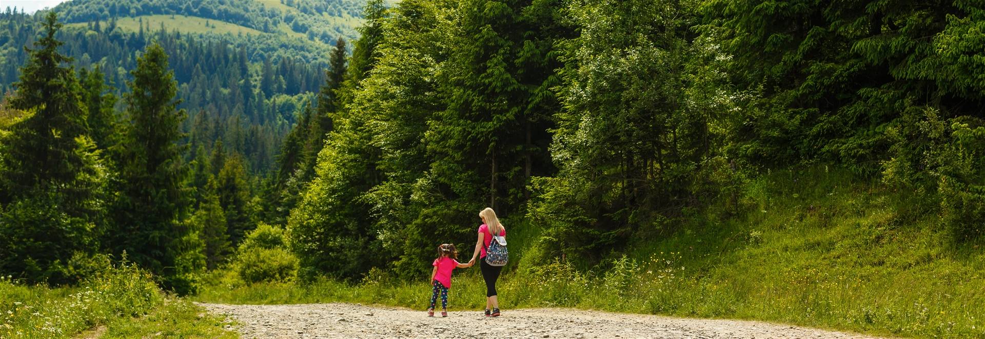 Woman and Child Hiking on Trail in Big Sky Montana